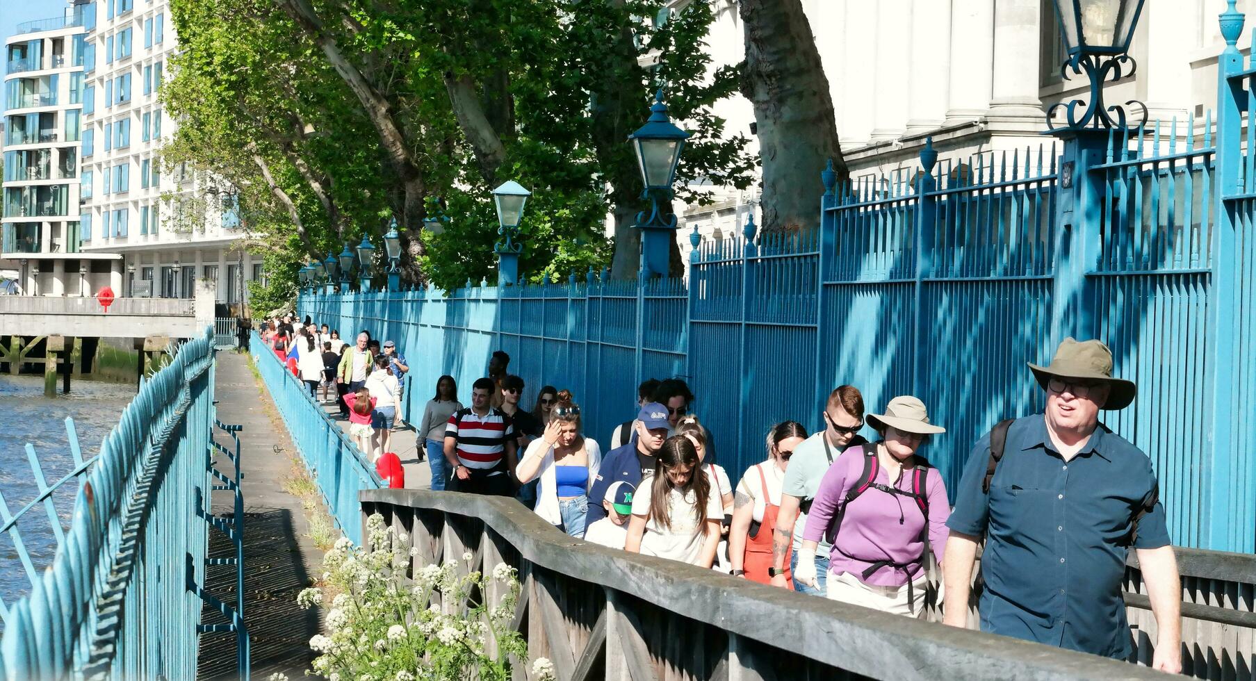 Most Beautiful Image of International Community Tourist People are Visiting Tower Bridge and River Thames at Central London Capital City of England Great Britain UK on Sunny Day of June 4th, 2023 photo