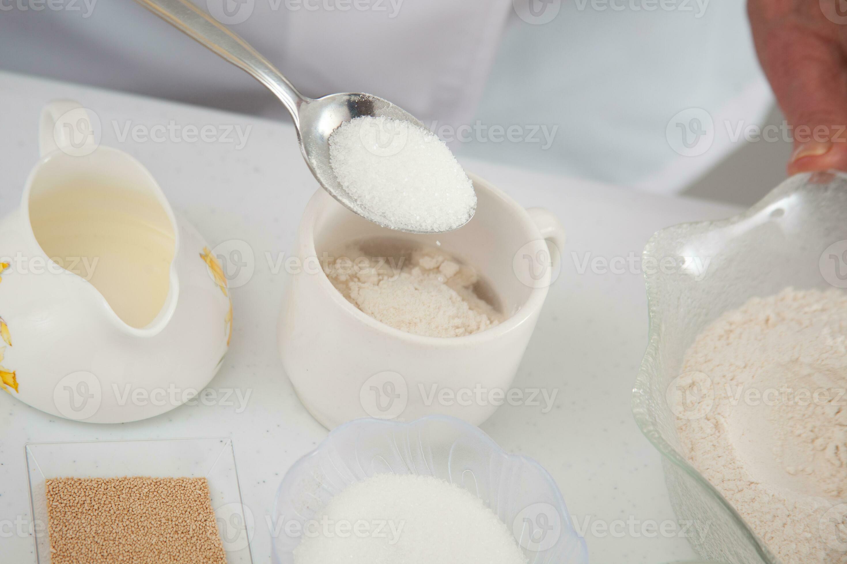 Leaven yeast. Yeast preparation for pizza dough. Adding sugar. Home