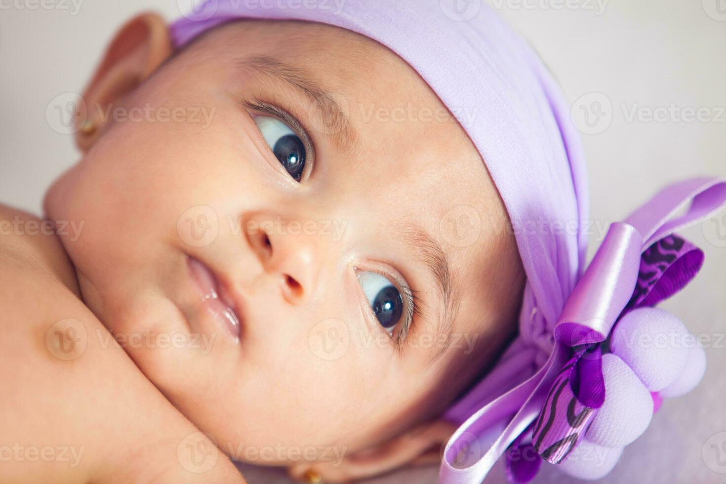 Portrait of a beautiful four months baby girl photo