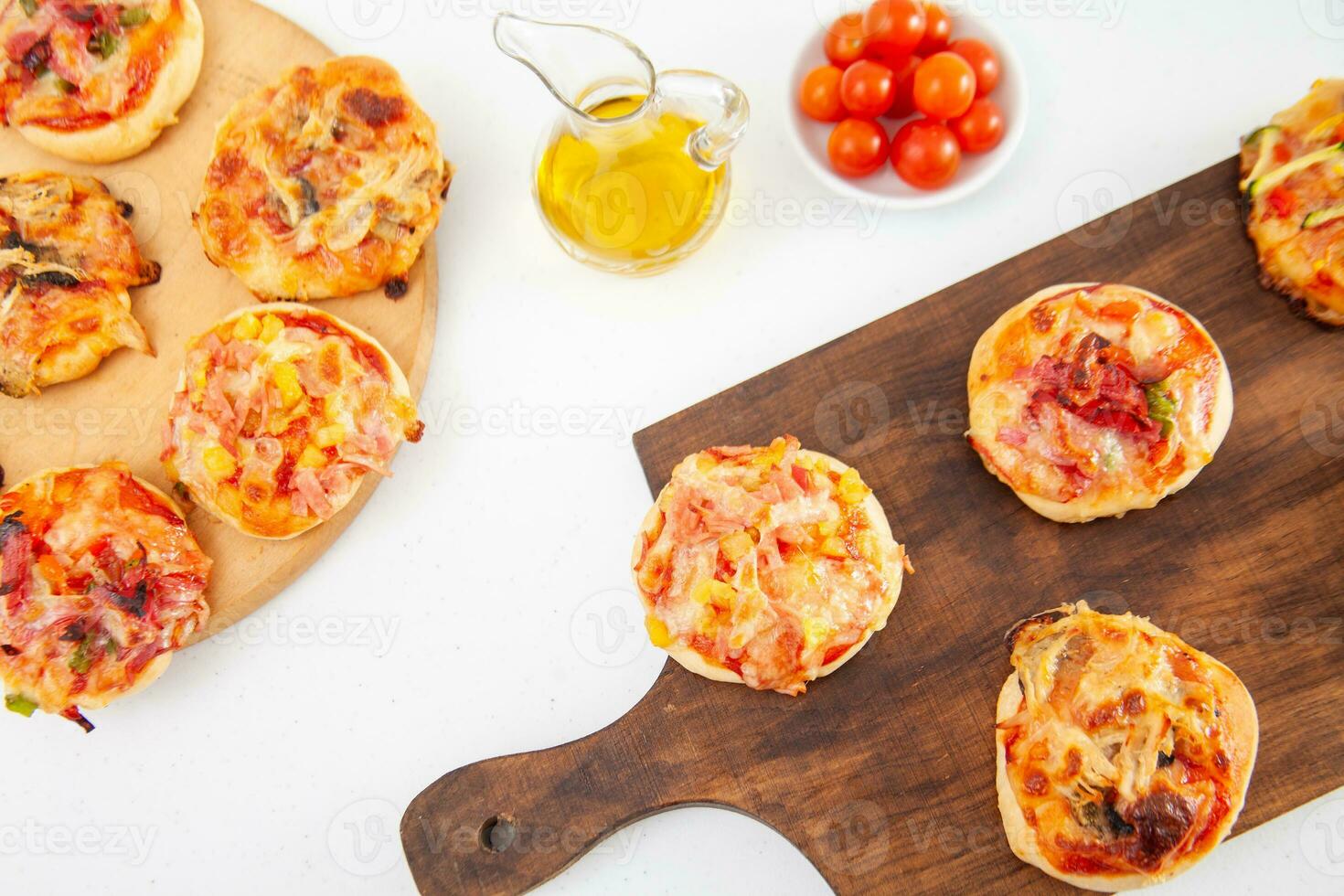 Delicious just baked homemade mini pizzas. photo