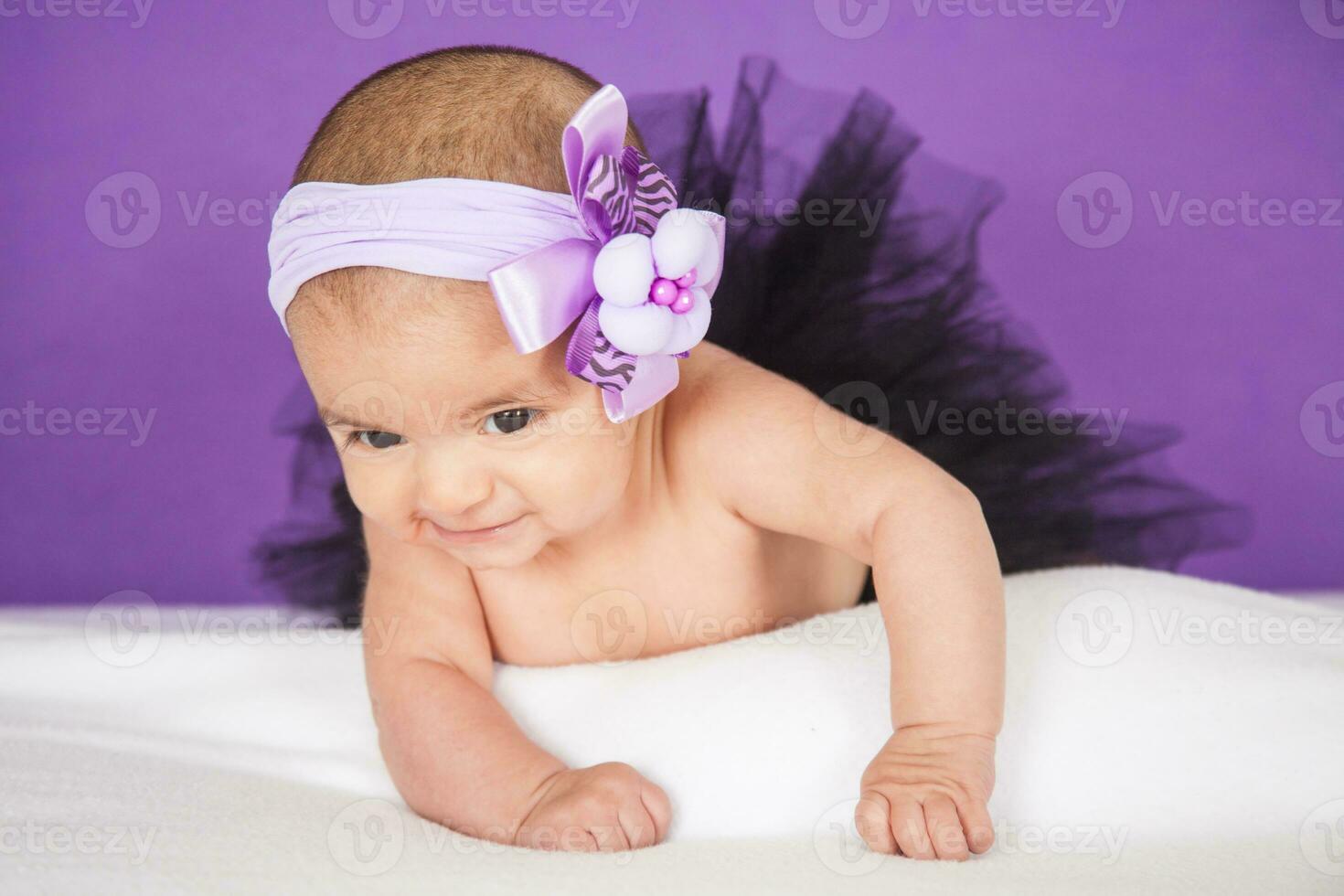 Portrait of a beautiful four months baby girl photo