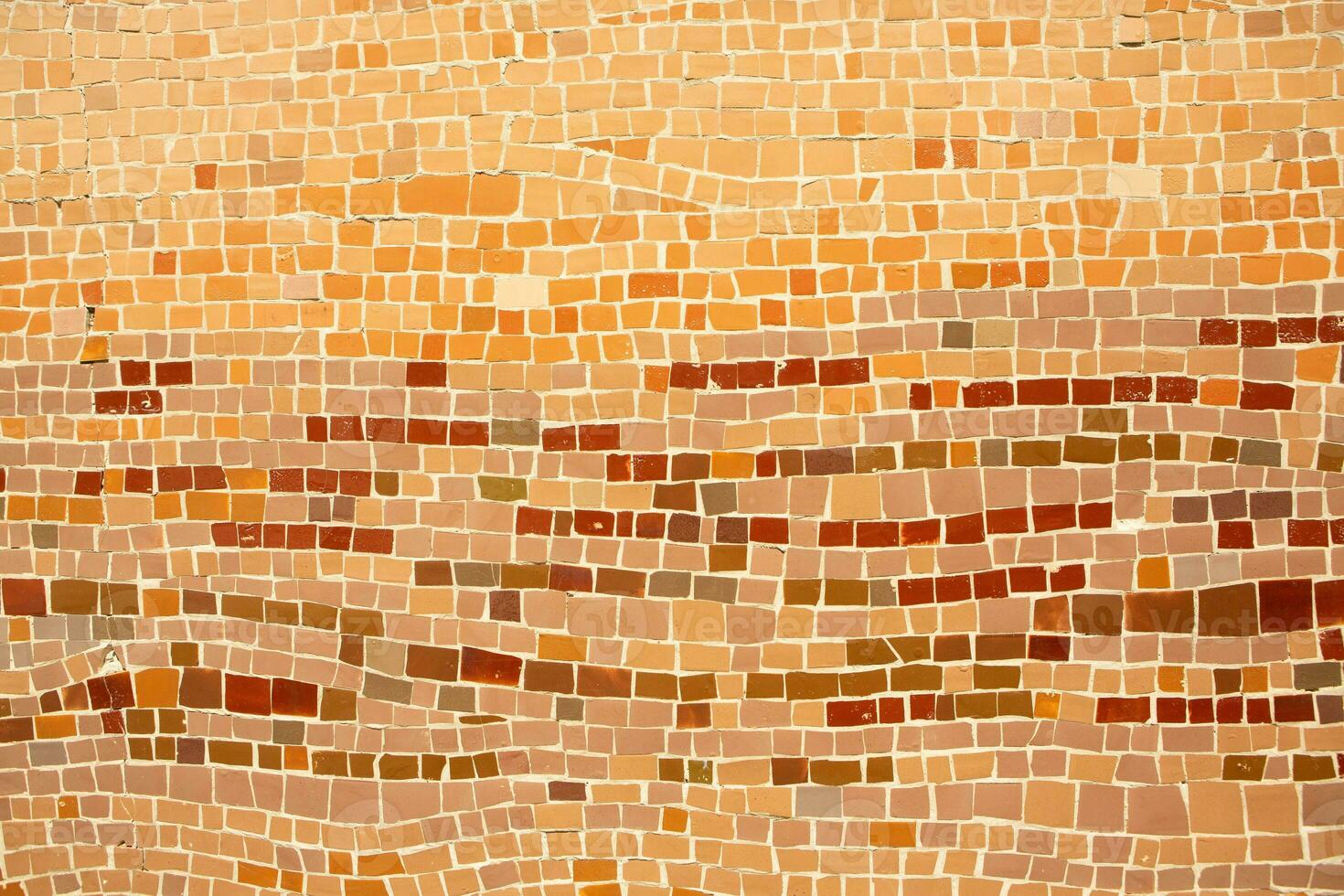 Colorful ceramic mosaic on the walls of the building. Abstract background and texture for design. photo