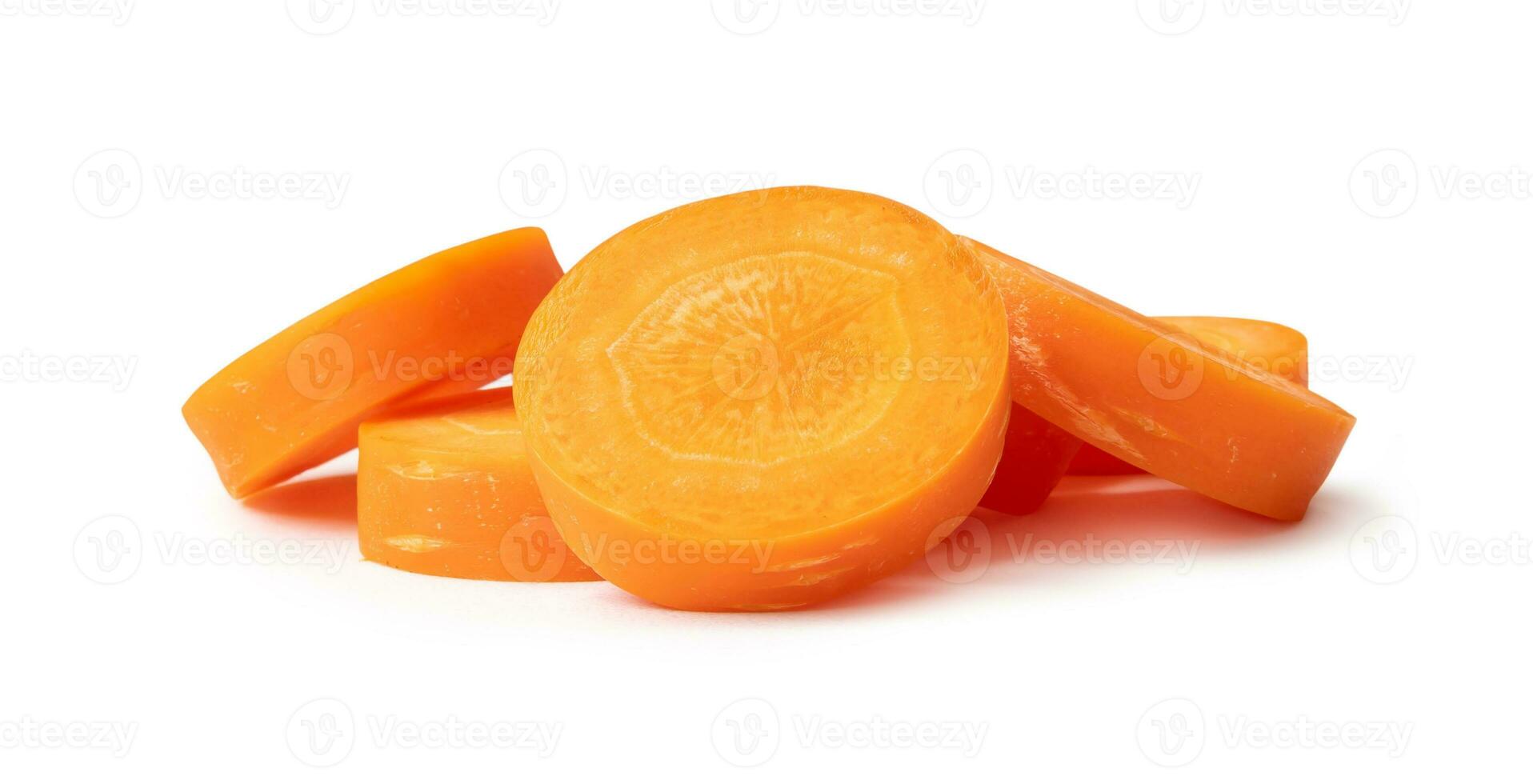 Fresh beautiful carrot slices in stack isolated on white background witch clipping path. Front view. photo