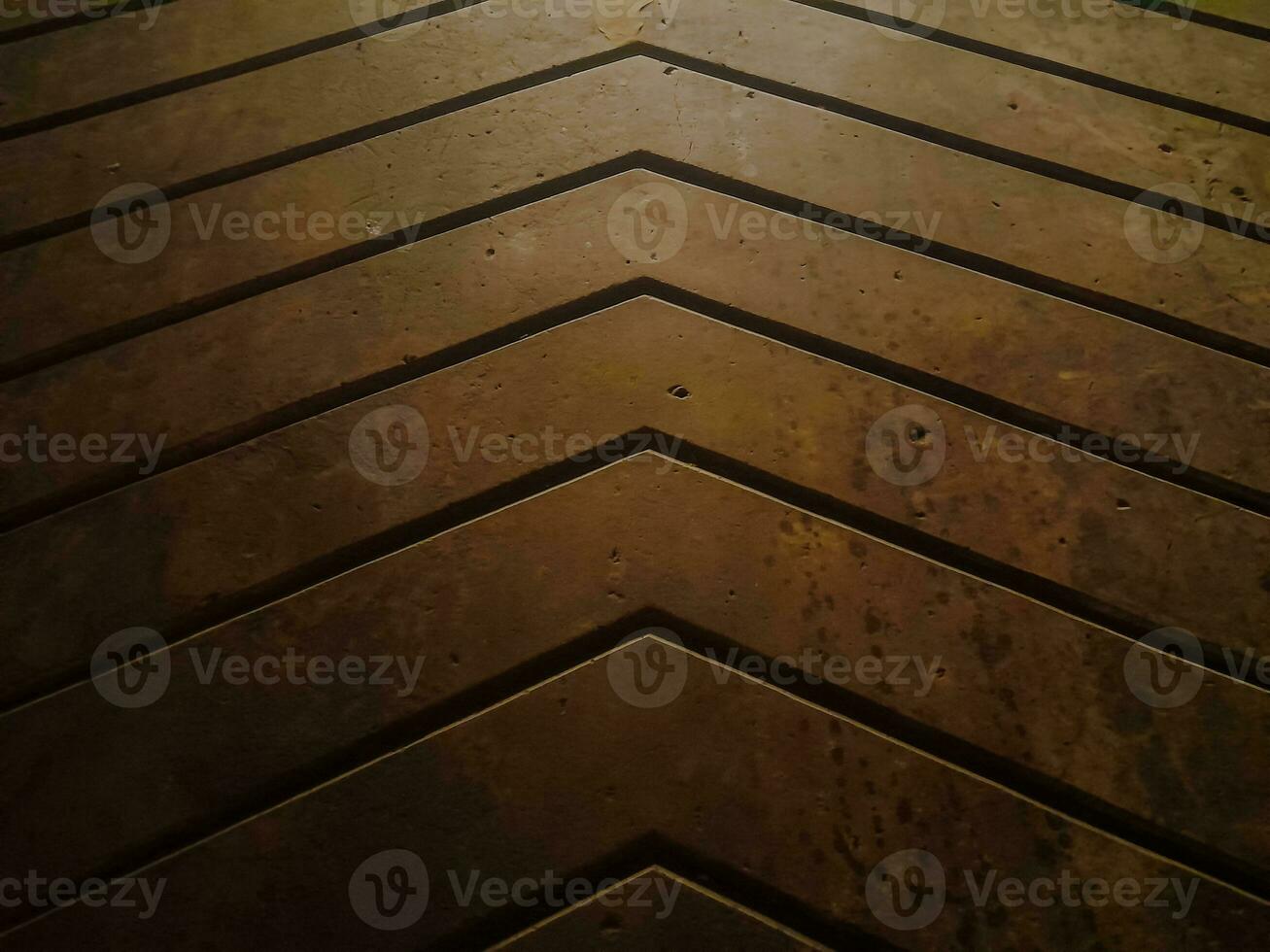 Triangle lines on the floor, serves as a guide for straight ahead, it can also be for water ditches so that they don't stagnate photo