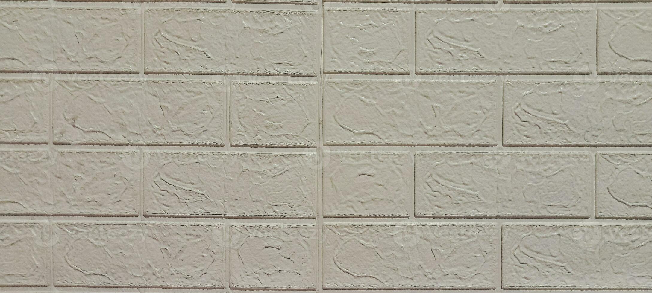 The background design is a rectangular wall shape with broken white color photo
