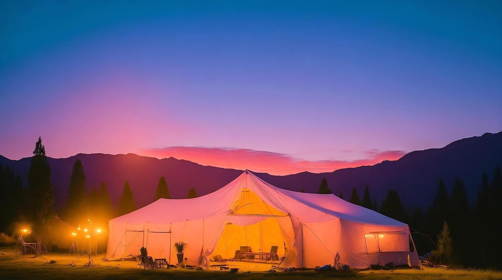 Camping in the mountains at sunset. photo
