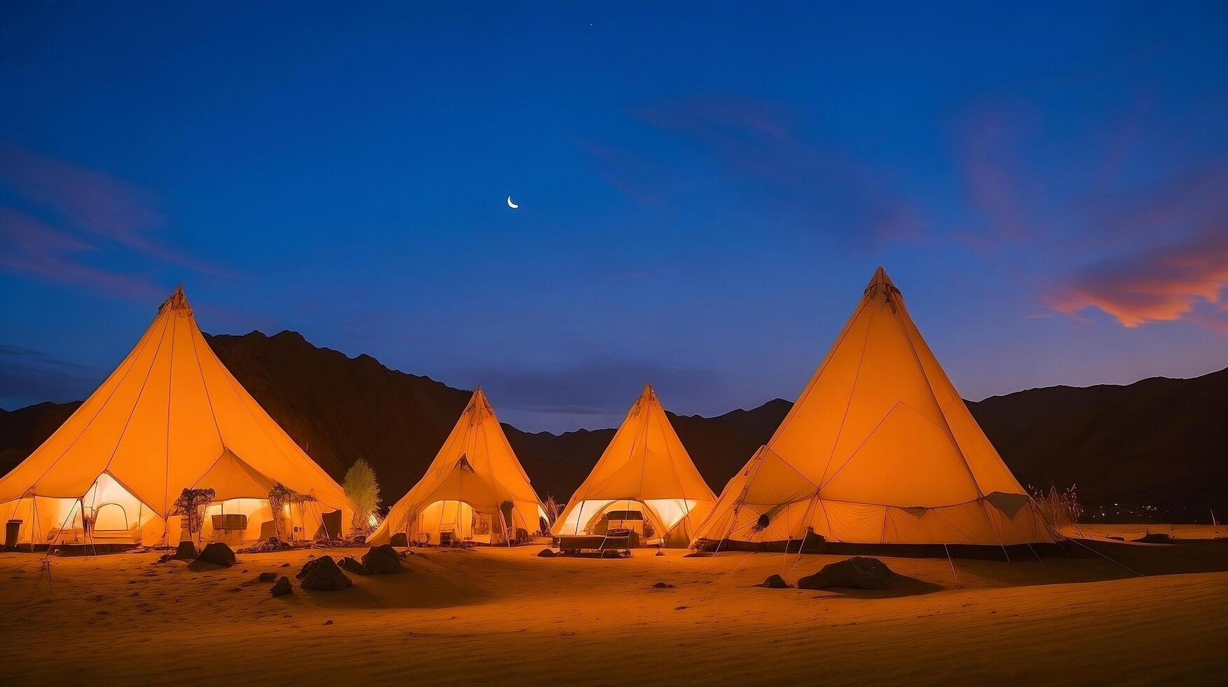 Camping in the mountains at sunset. photo