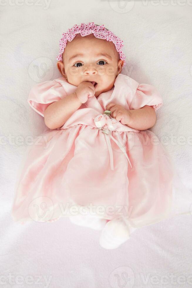 Portrait of a beautiful four months baby girl photo