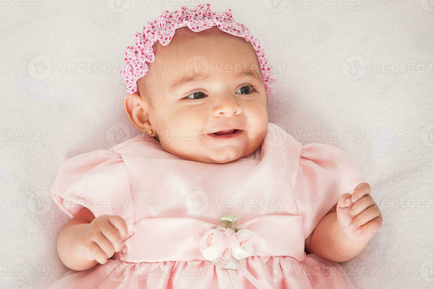 Portrait of a beautiful four months baby girl photo