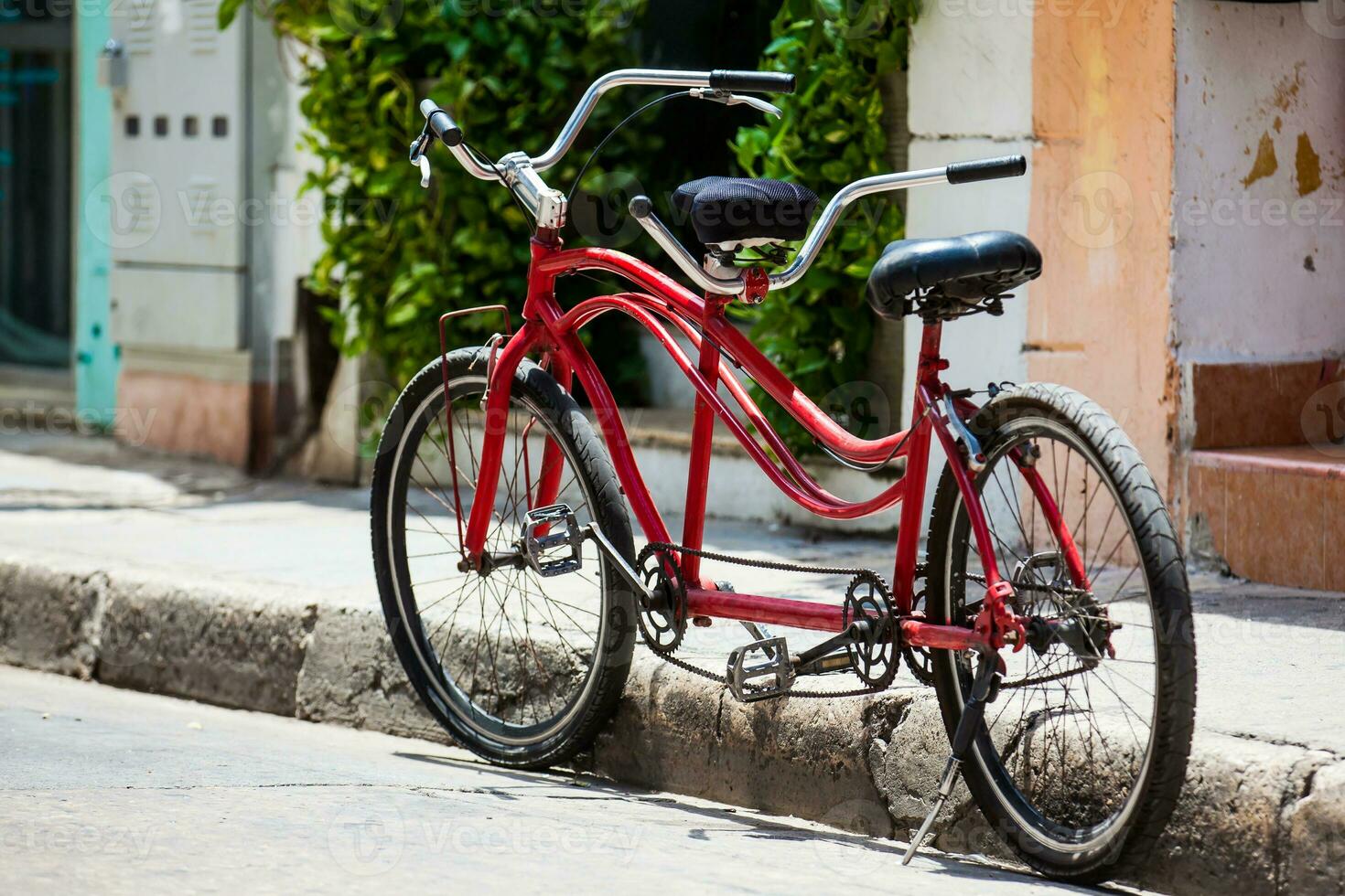 Bicycle parked at the beautiful streets of the walled city in Cartagena de Indias. Urban bicycle concept. Mobility concept photo