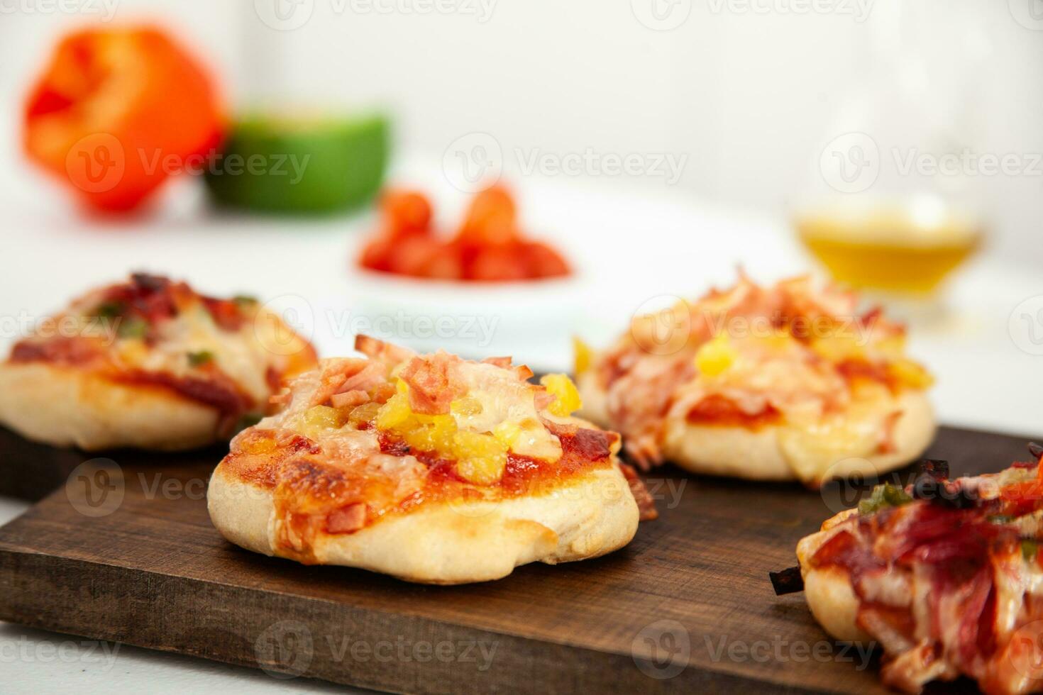 Delicious just baked homemade mini pizzas. photo