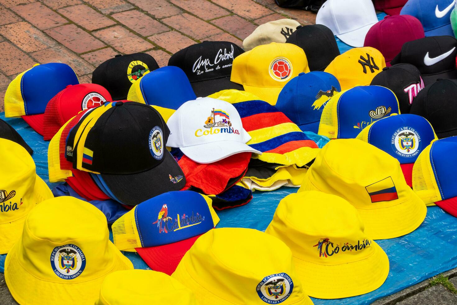 Bogota, Colombia, 16 August 2023. Hats and flags for sale for the march asking for Gustavo Petro impeachment. La Marcha de la Mayoria. photo