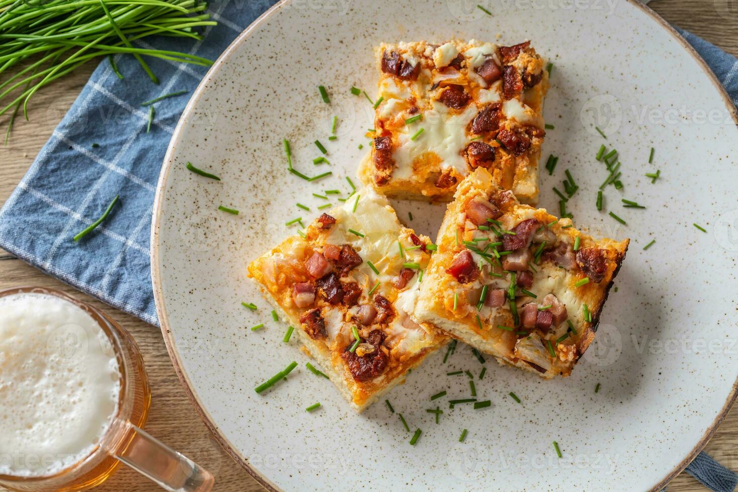 Slovak national dish podpecnik, podplamennik or posuch. Slovak national dish is made sourdough, bryndza, sour cream, bacon and onion photo