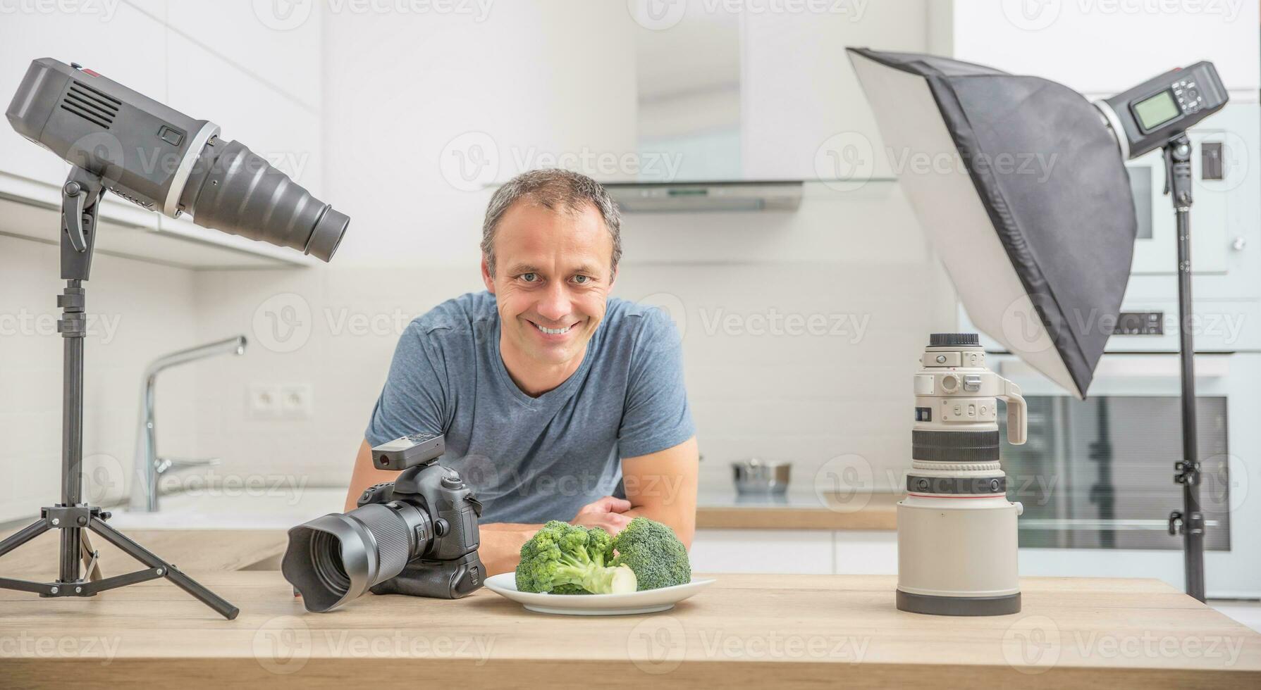 Photographer professional in her studio kitchen with equipment c photo