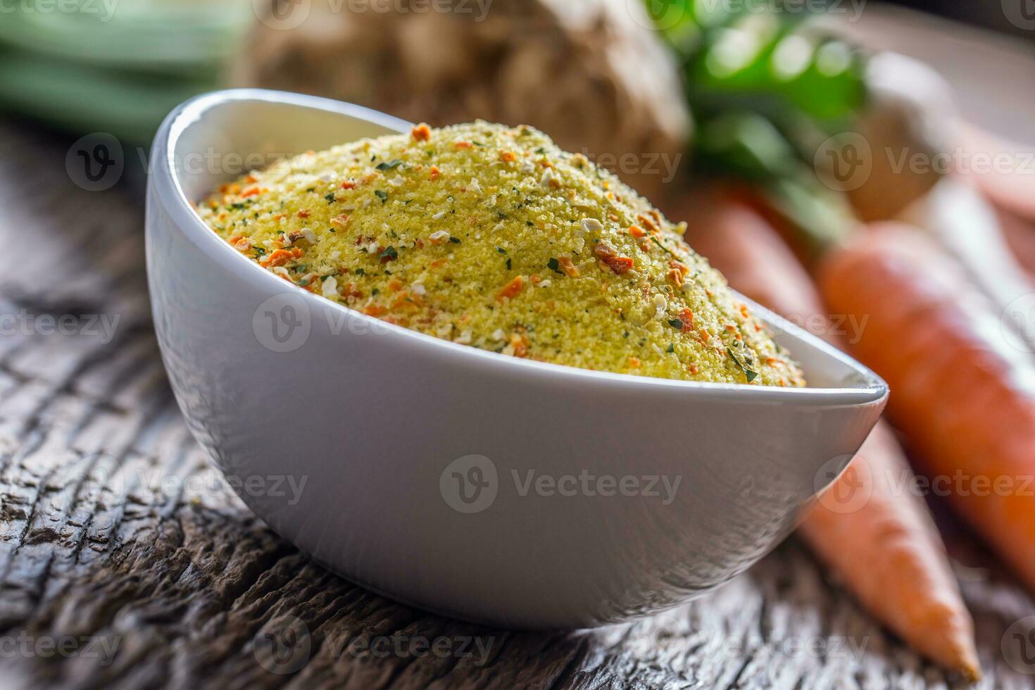 Vegeta seasoning spices condiment with dehydrated carrot parsley celery parsnips and salt with or without glutamate photo