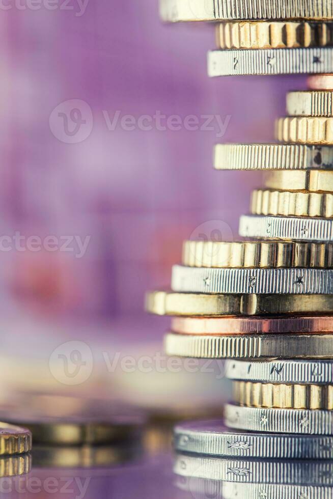 Euro Coins stacked on each other in different positions. Money concept. photo