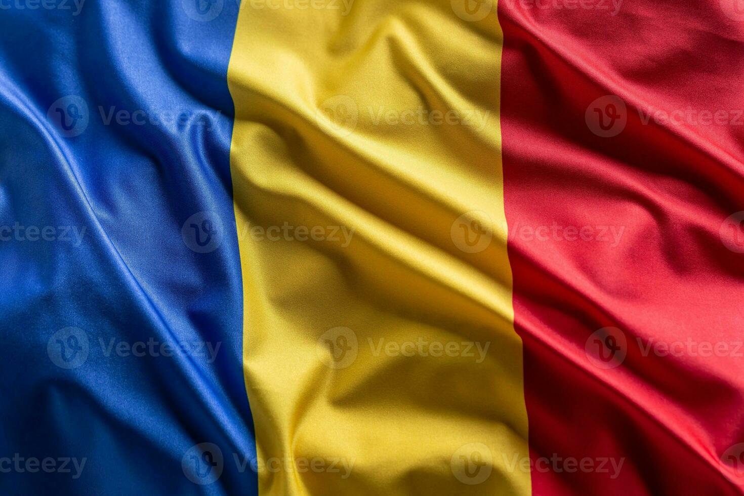 Waving flag of Romania. National symbol of country and state photo