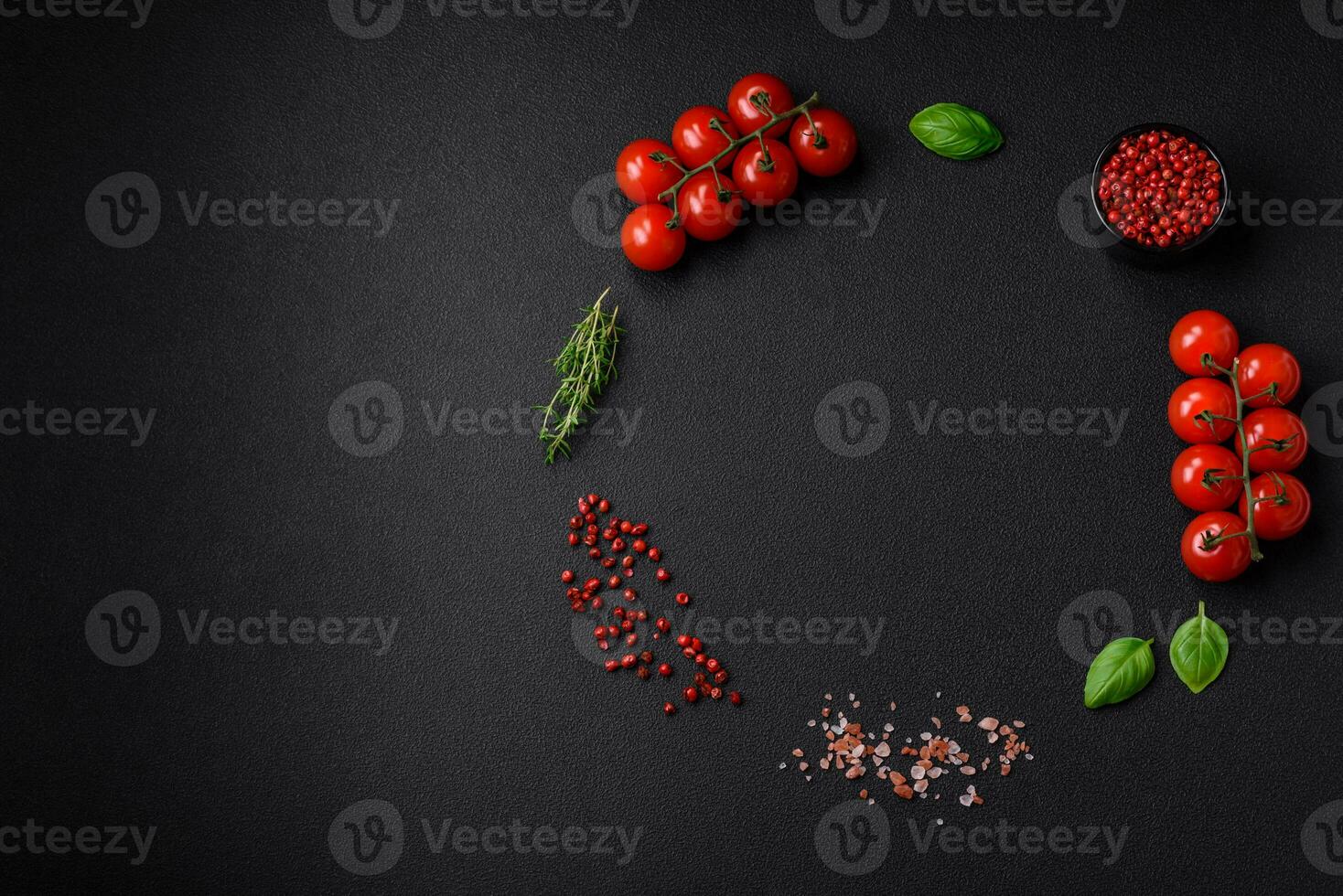 Ingredients for cooking cherry tomatoes, salt, spices and herbs photo