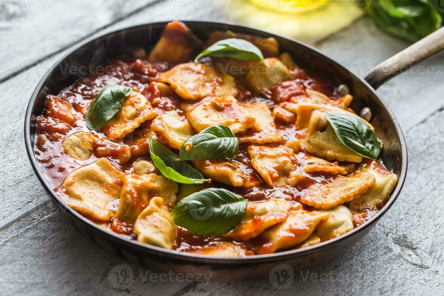 Italian or mediterranean food pasta ravioli of tomato sauce. photo