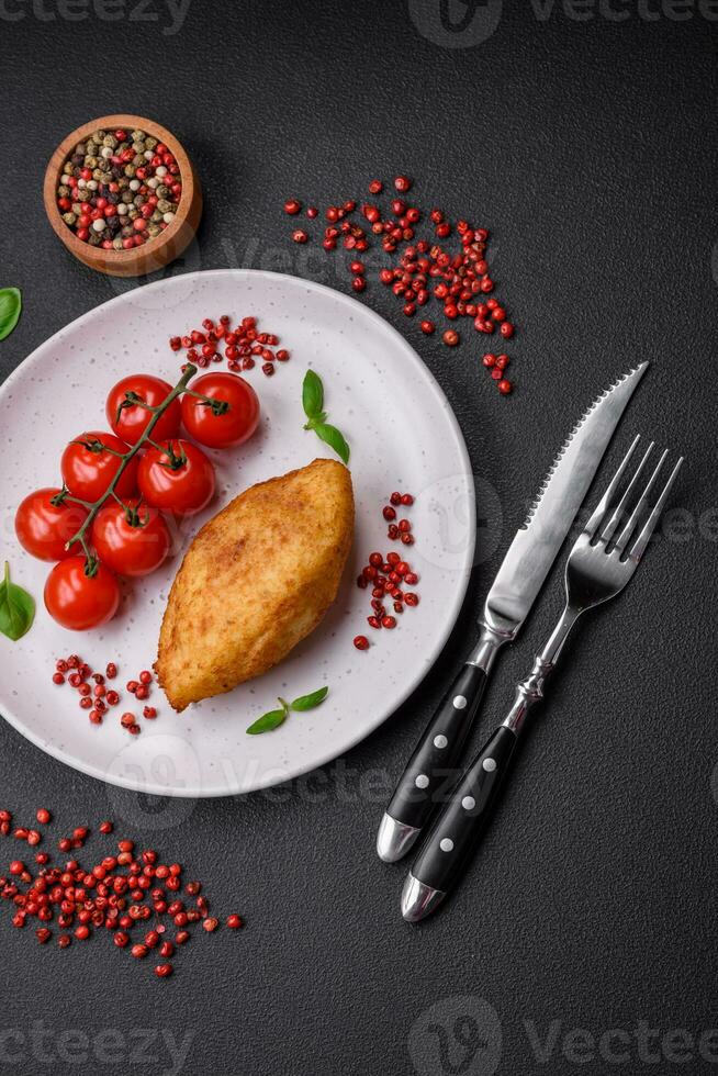 Delicious baked potato cutlet stuffed with chicken and vegetables, spices and salt photo