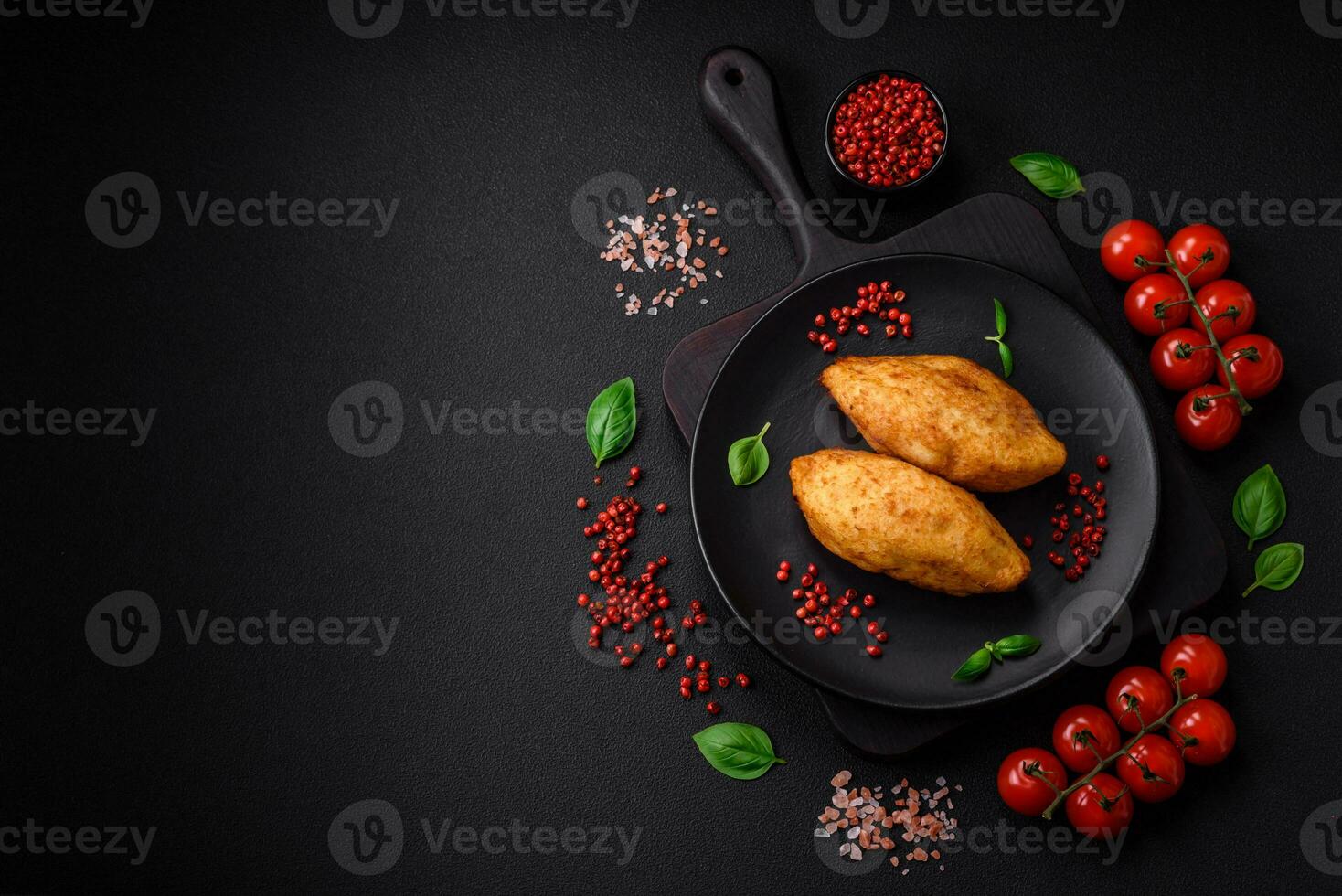 Delicious baked potato cutlet stuffed with chicken and vegetables, spices and salt photo