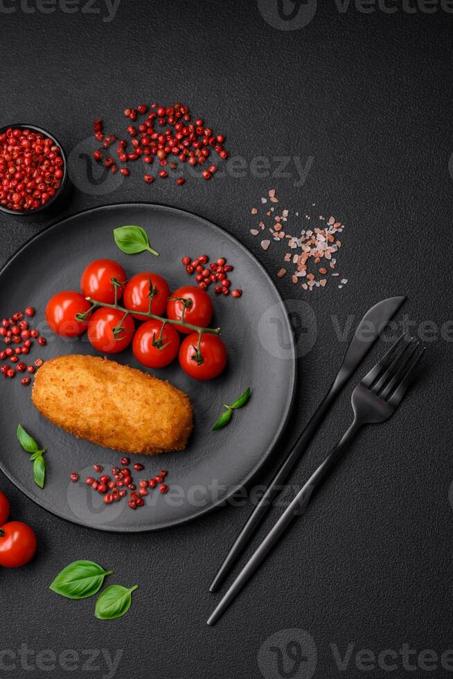 Delicious baked potato cutlet stuffed with chicken and vegetables, spices and salt photo