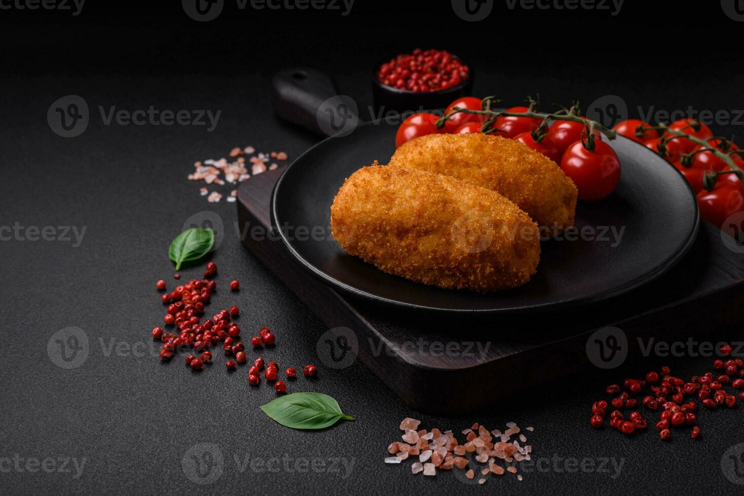 Delicious baked potato cutlet stuffed with chicken and vegetables, spices and salt photo