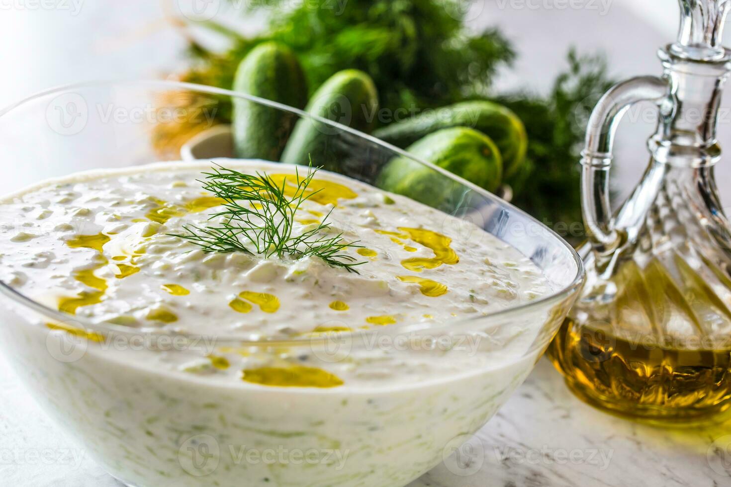 Traditional Greek dip sauce or dressing tzatziki. photo