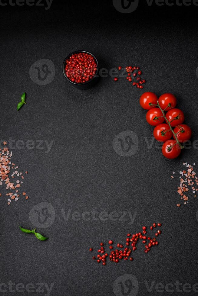 Ingredients for cooking cherry tomatoes, salt, spices and herbs photo