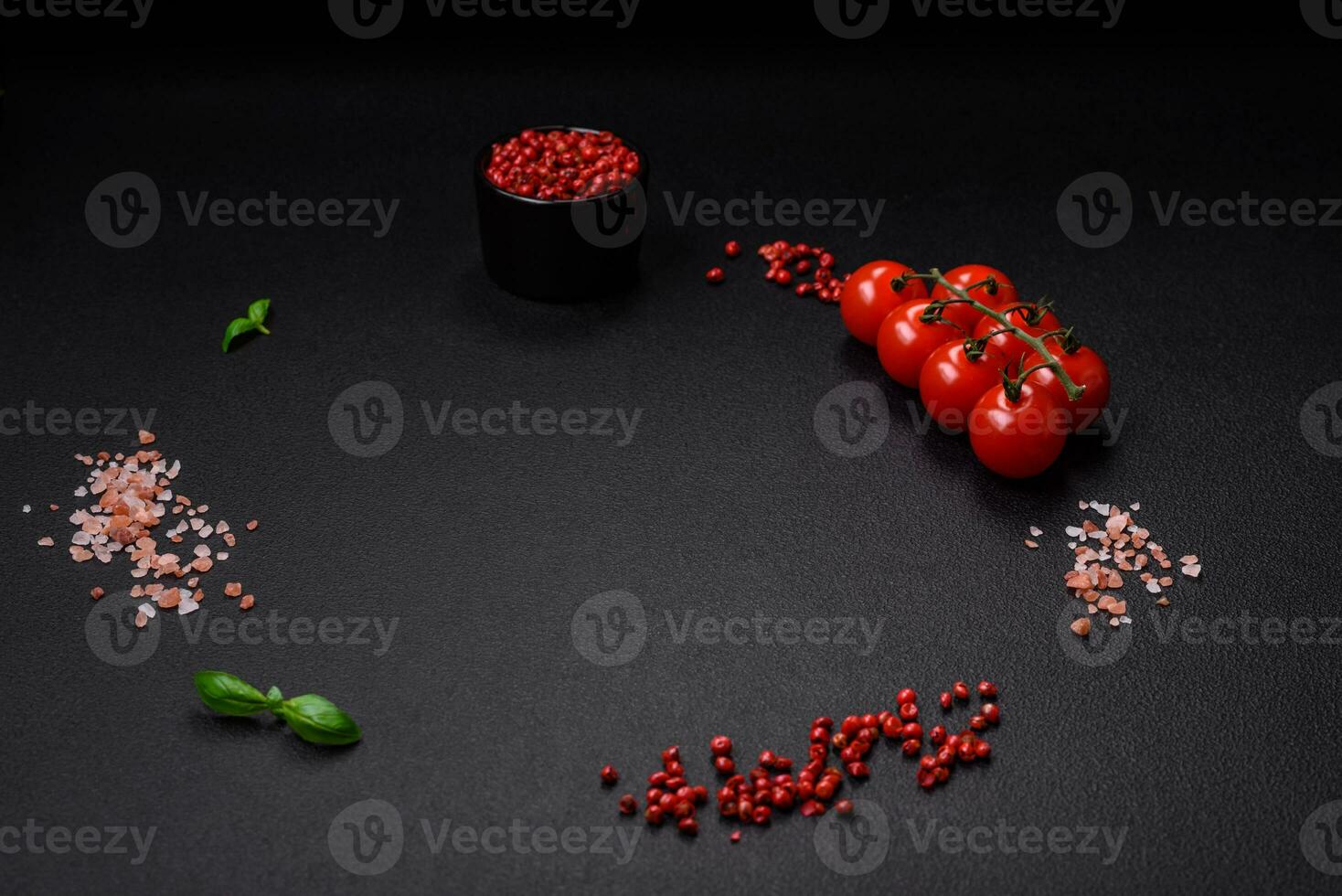 Ingredients for cooking cherry tomatoes, salt, spices and herbs photo