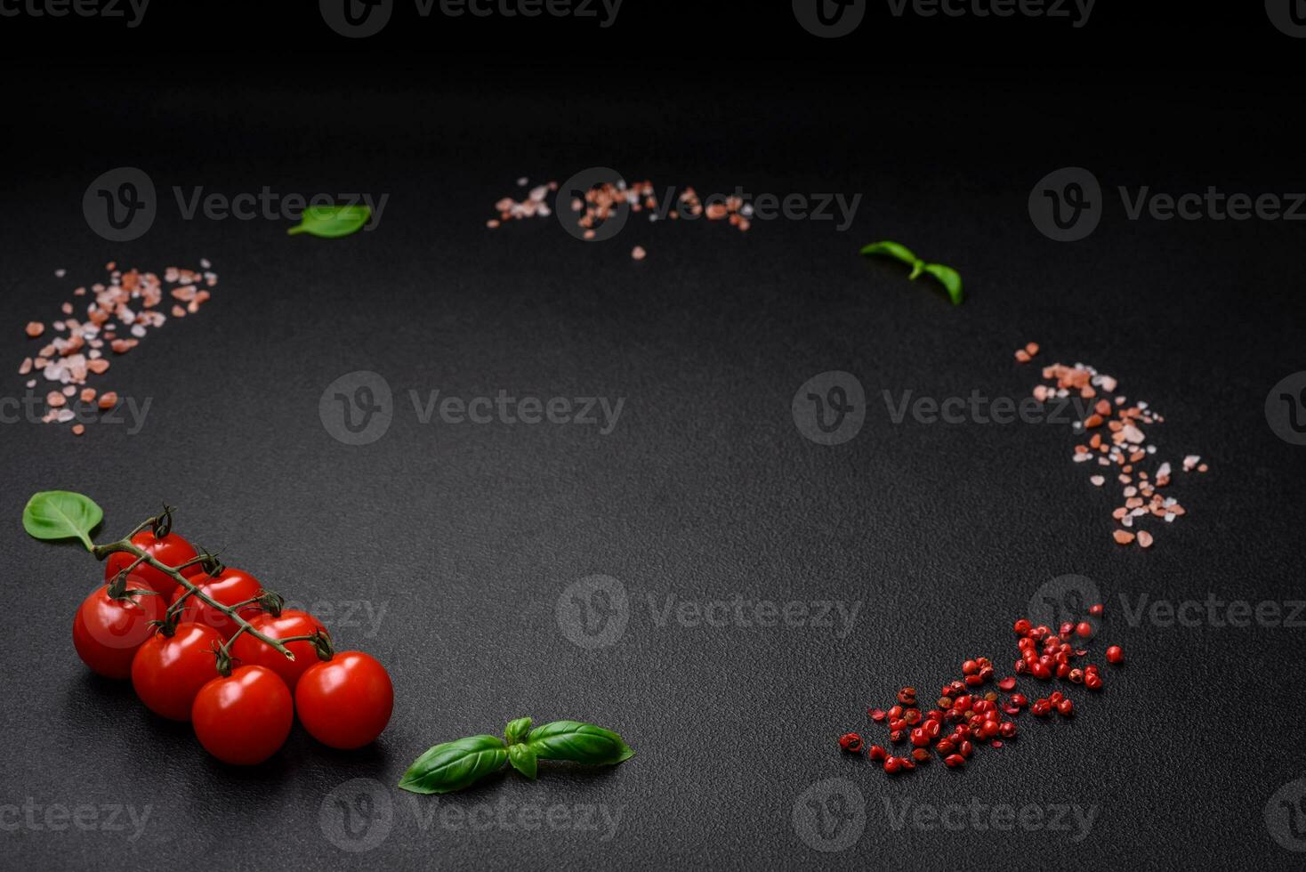 Ingredients for cooking cherry tomatoes, salt, spices and herbs photo