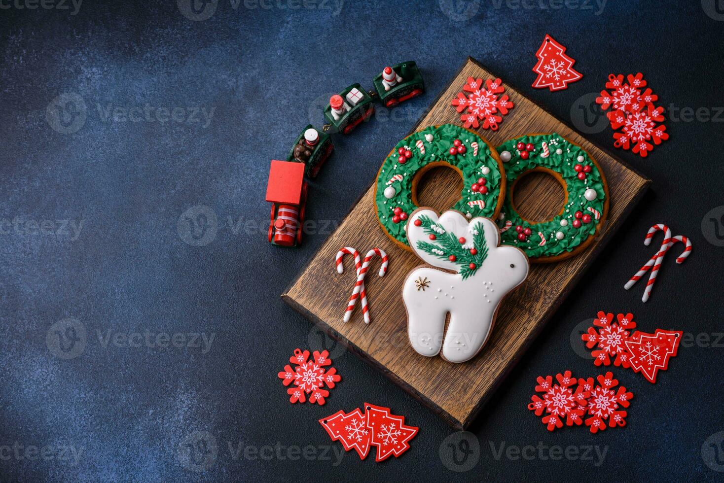 Beautiful festive Christmas gingerbread made by hand with decoration elements photo