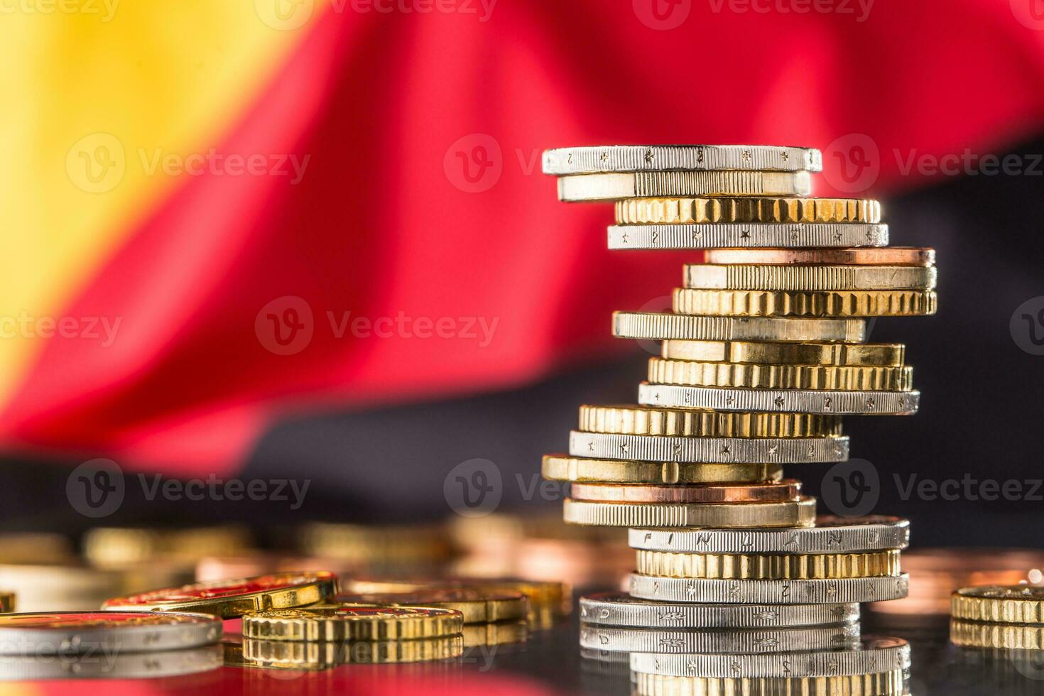 National flag of germany and euro coins - concept. Euro coins. Euro money. Euro currency photo