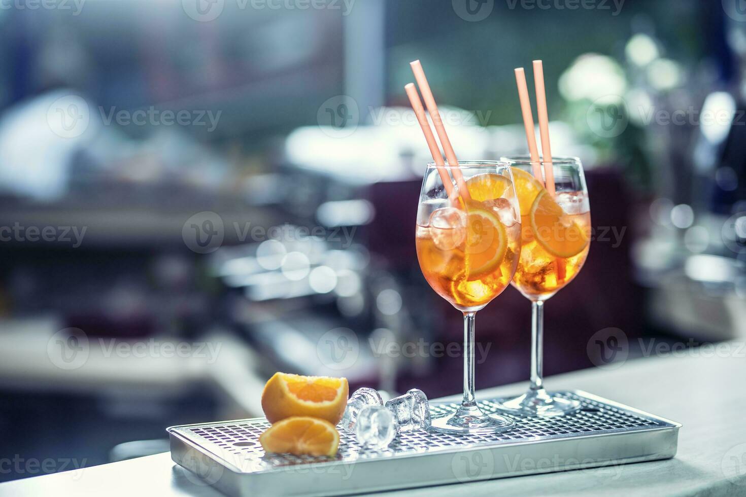 Aperol spritz drink on bar counter in pub or restaurant photo