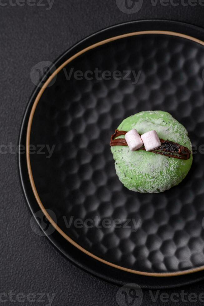 Delicious sweet colorful mochi desserts or ice cream with rice dough and toppings photo