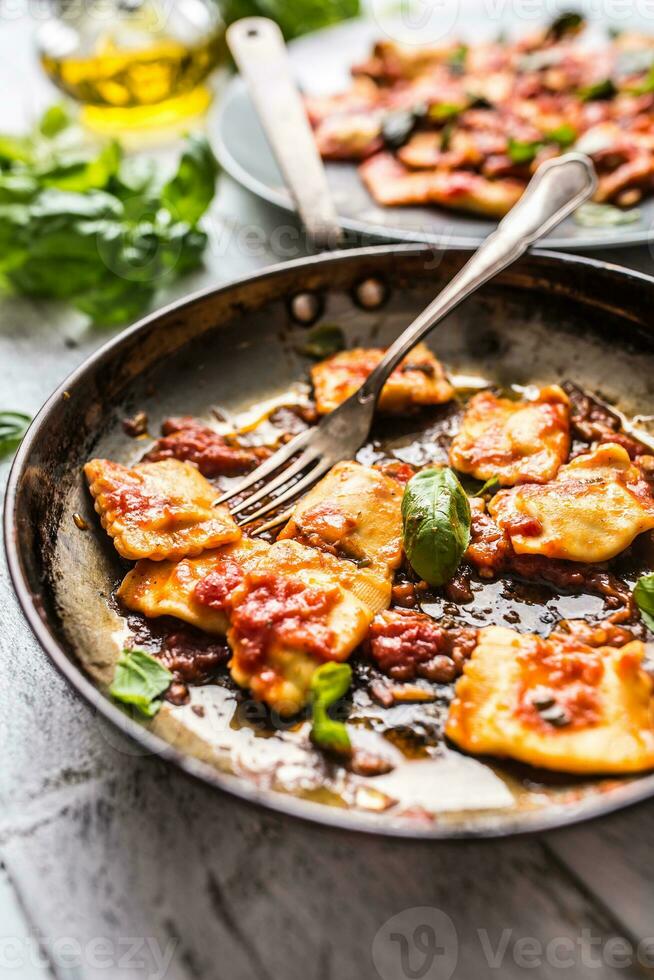 Italian or mediterranean food pasta ravioli of tomato sauce. photo