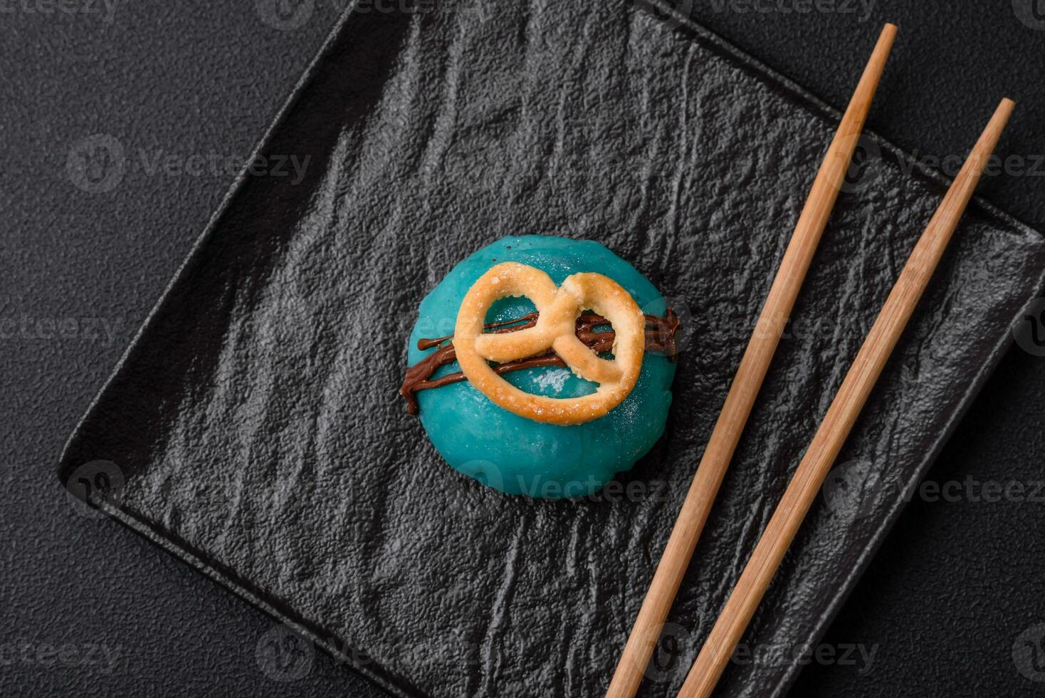 Delicious sweet colorful mochi desserts or ice cream with rice dough and toppings photo