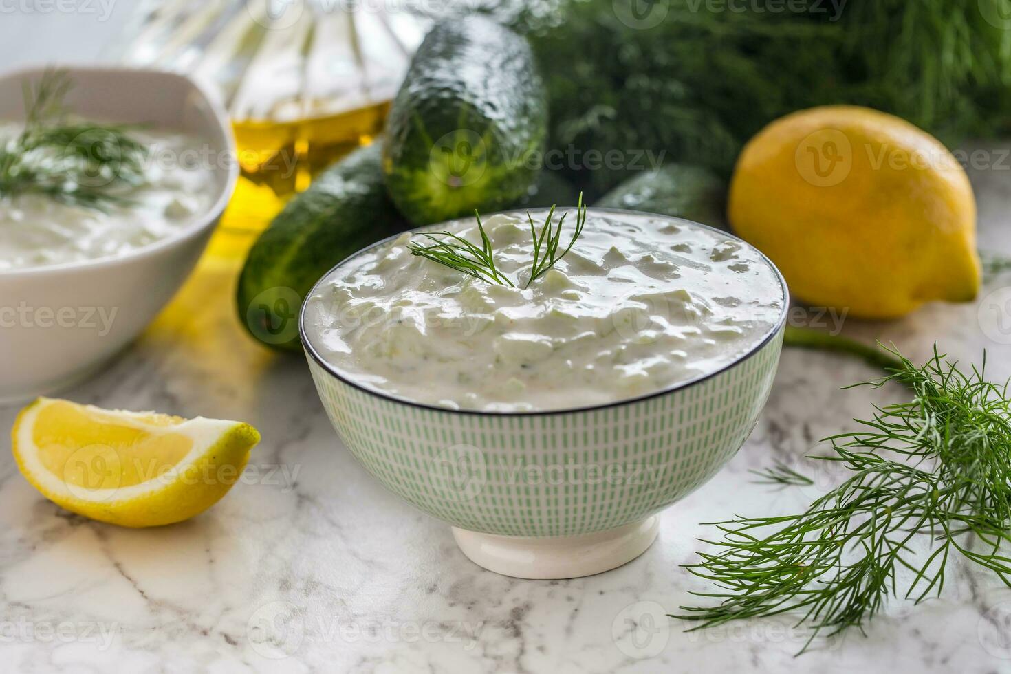 Traditional Greek dip sauce or dressing tzatziki. photo