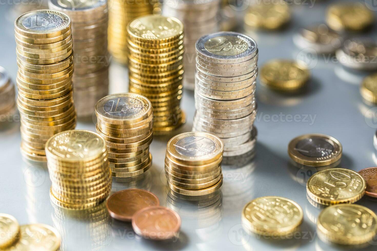 Towers of the euro coins stacked in different positions 27491232 Stock
