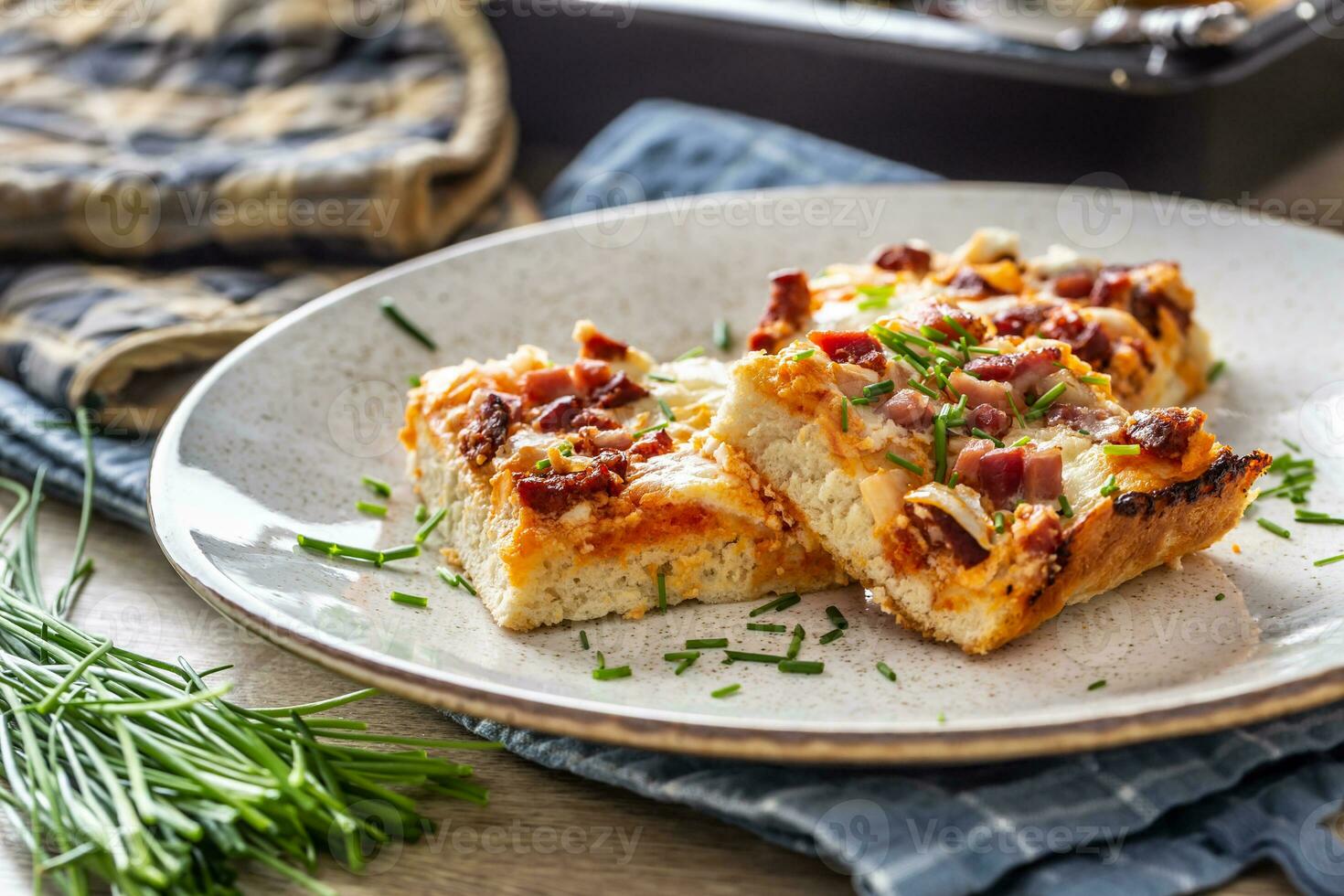Slovak national dish podpecnik, podplamennik or posuch. Slovak national dish is made sourdough, bryndza, sour cream, bacon and onion photo