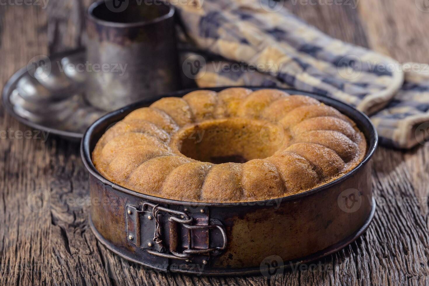 Marble cake.Easter Cake. Marble cake cup of coffee powder sugar and kitchen vintage utensil. photo