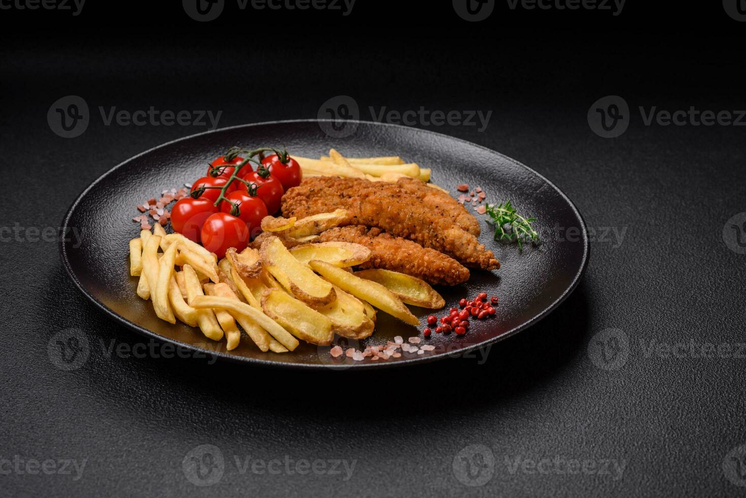 Delicious crispy chicken nuggets breaded with salt and spices photo