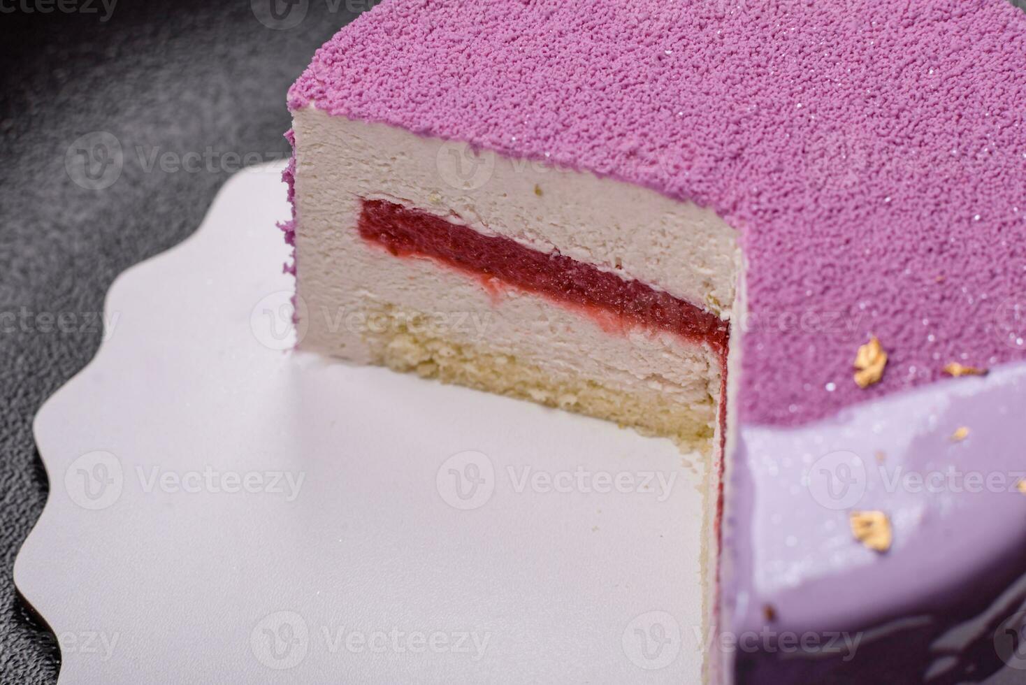 Delicious fresh sweet mousse cake with berry filling photo