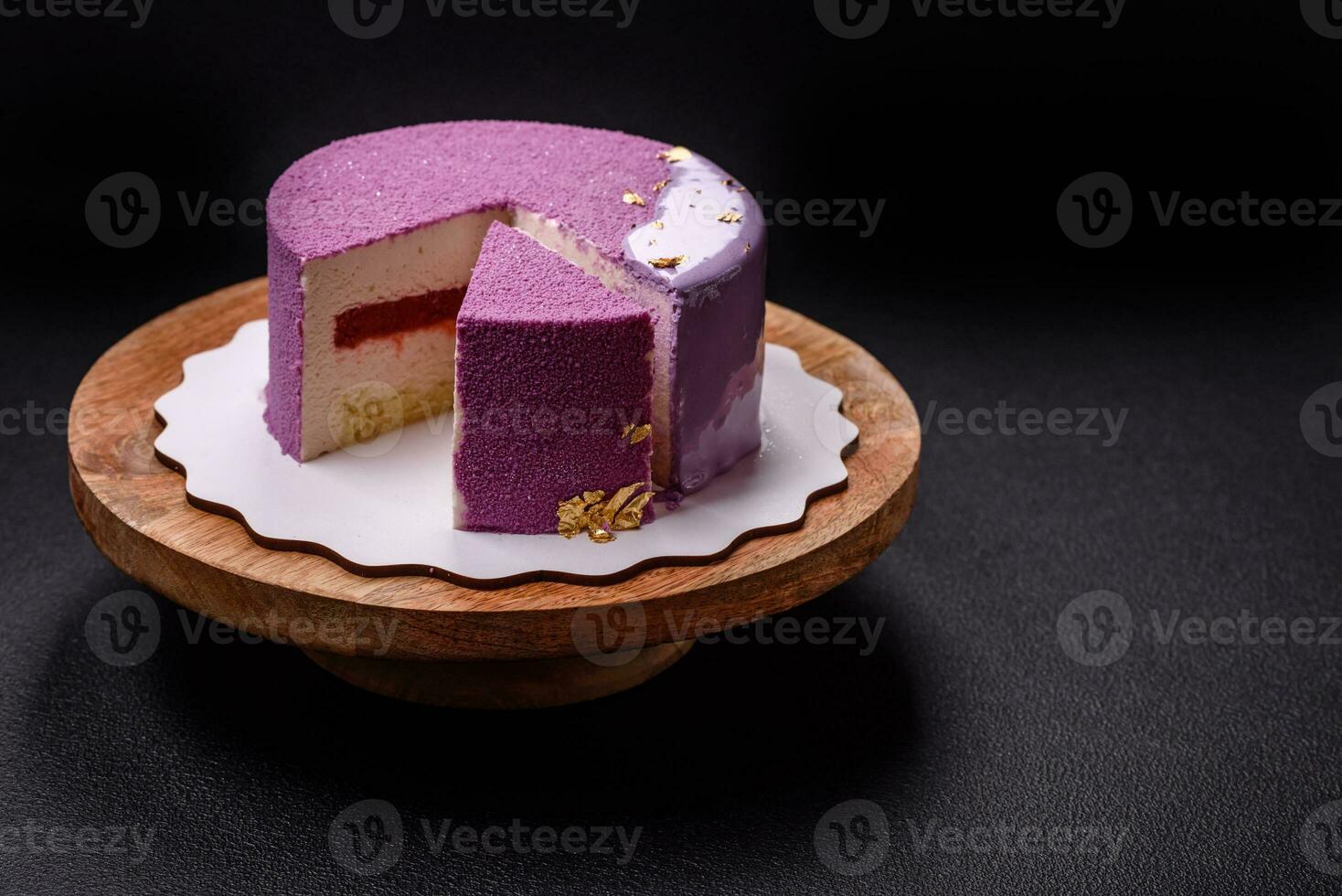 Delicious fresh sweet mousse cake with berry filling photo