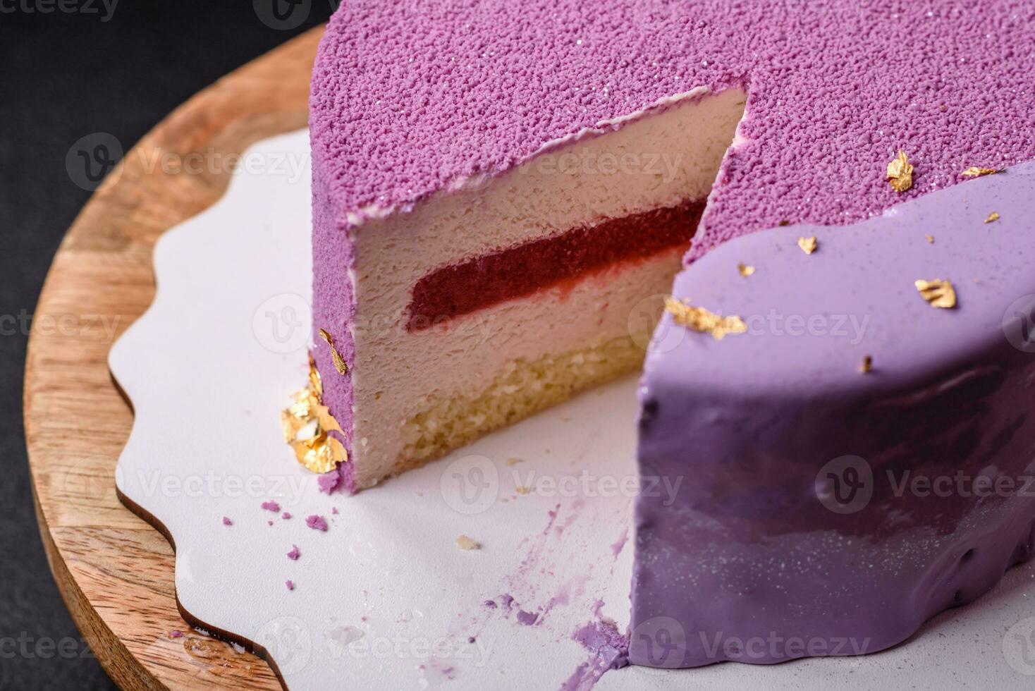 Delicious fresh sweet mousse cake with berry filling photo