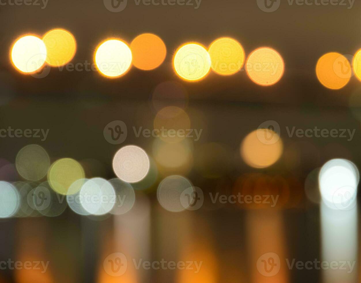 Defocused lights in the city at night photo