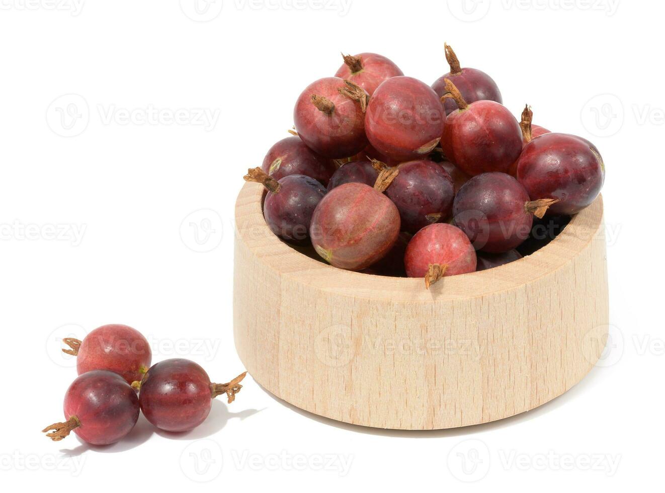 Bunch of red ripe gooseberries isolated on white background photo