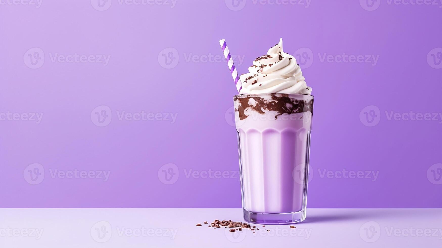 Milkshake with cream and straw. photo