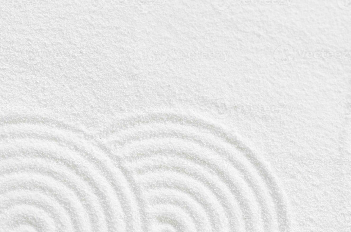 Sand texture with simple spiritual patterns,Japanese Zen Garden with concentric circles and parallel lines on  white sandy surface background,Harmony,Meditation,Zen like concept photo