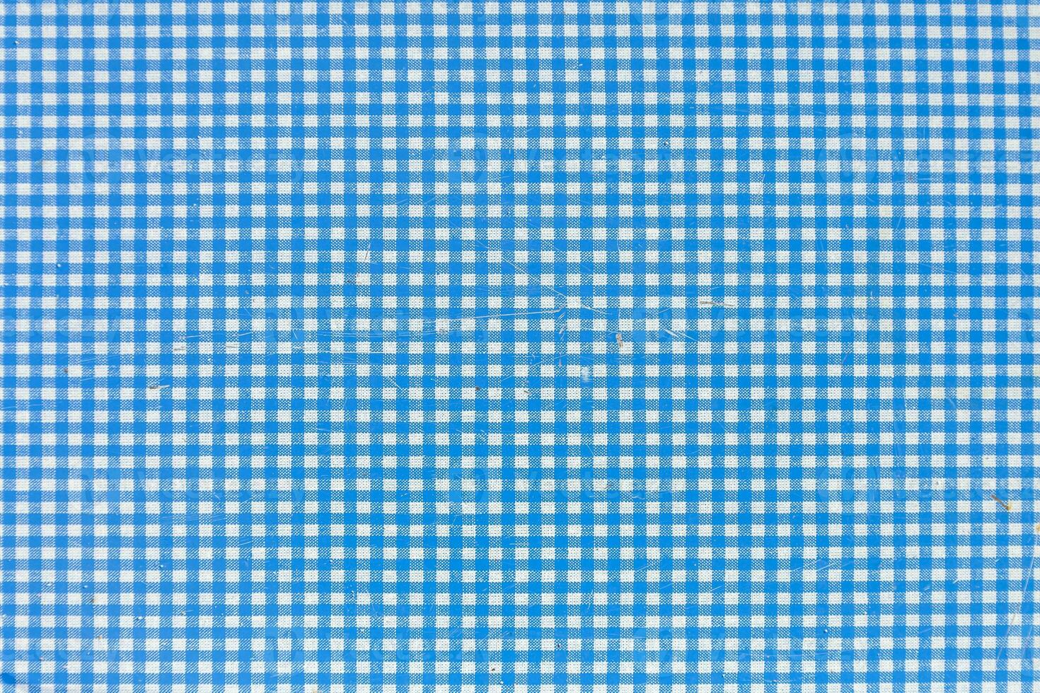 background of blue and white checkered paper sheet photo